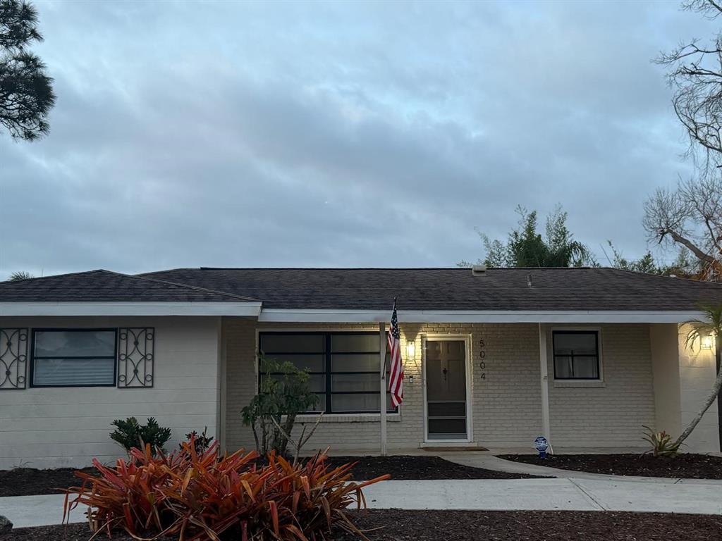 5004 Medalist Road Sarasota, FL 34243 - Photo 2 of 42