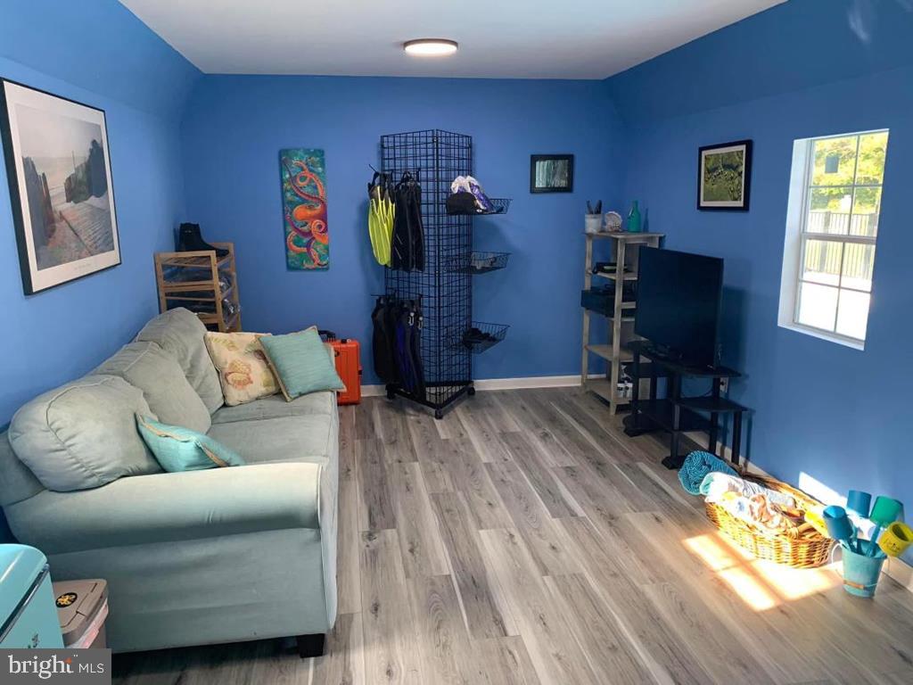 1960 Erica Road Montross, VA 22520 - Photo 22 of 35 a living room with furniture and a flat screen tv