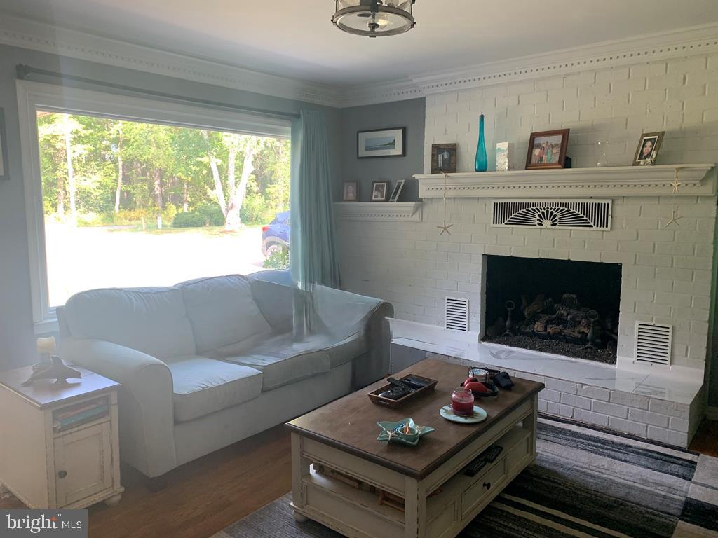 1960 Erica Road Montross, VA 22520 - Photo 25 of 35 a living room with furniture and a fireplace