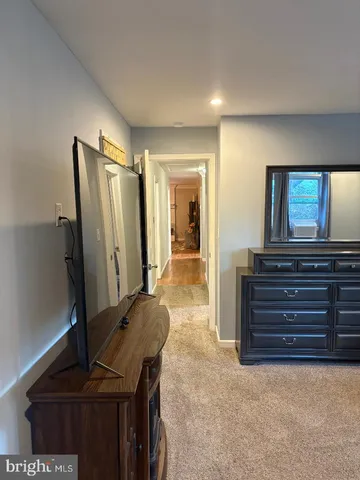 a view of a hallway with workspace