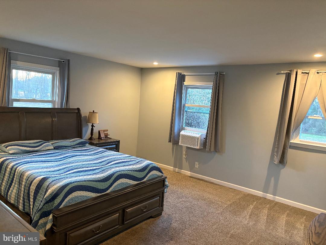 1960 Erica Road Montross, VA 22520 - Photo 32 of 35 a bedroom with a bed and a window