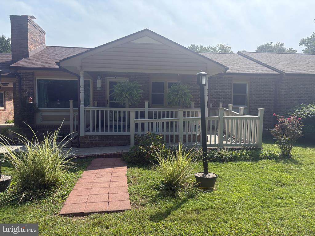 1960 Erica Road Montross, VA 22520 - Photo 5 of 35 a view of a porch with a garden