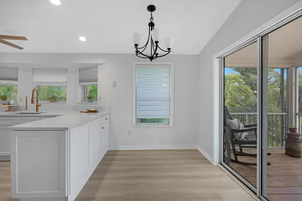 a view of a kitchen cabinets and a sink