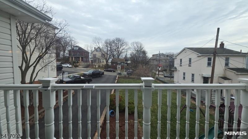342 Sherman Street Passaic, NJ 07055 - Photo 13 of 32 a view of a house with wooden fence
