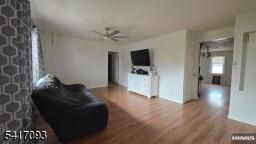 342 Sherman Street Passaic, NJ 07055 - Photo 16 of 32 a living room with furniture and a flat screen tv