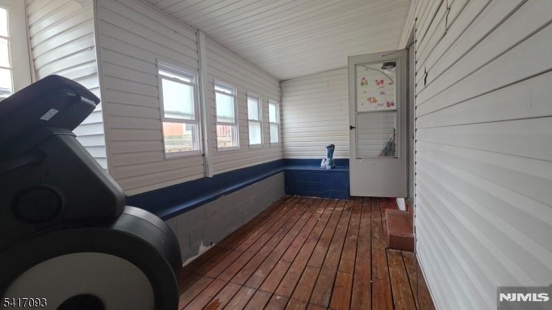 342 Sherman Street Passaic, NJ 07055 - Photo 22 of 32 a living room with furniture and wooden floor