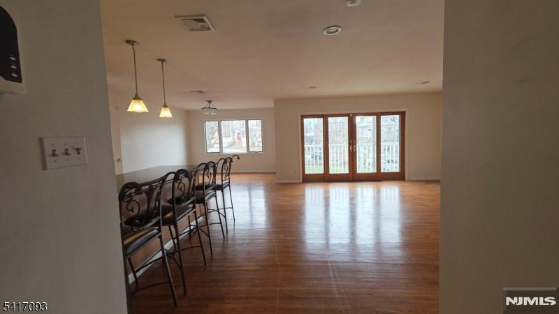 342 Sherman Street Passaic, NJ 07055 - Photo 5 of 32 a view of a livingroom with furniture wooden floor and chandelier