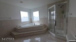 342 Sherman Street Passaic, NJ 07055 - Photo 6 of 32 a bathroom with a granite countertop sink a toilet and shower