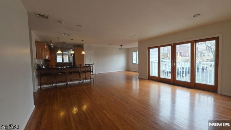 342 Sherman Street Passaic, NJ 07055 - Photo 9 of 32 a view of a room with kitchen appliances and a large window