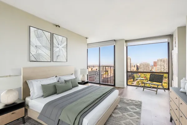 a bed room with a bed and a couch