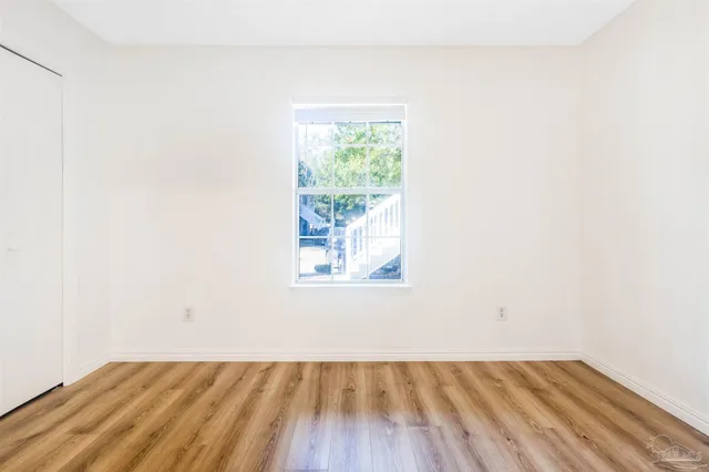 a view of a room that has a window in it