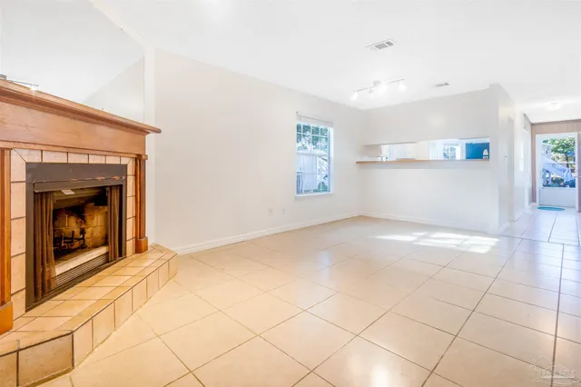 a view of front door with wooden floor