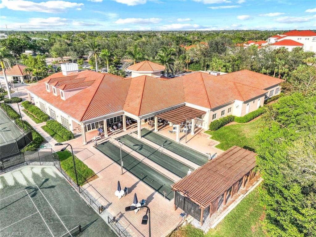 2190 Arielle Drive, Unit 903 Naples, FL 34109 - Photo 25 of 26 an aerial view of residential houses with outdoor space and trees