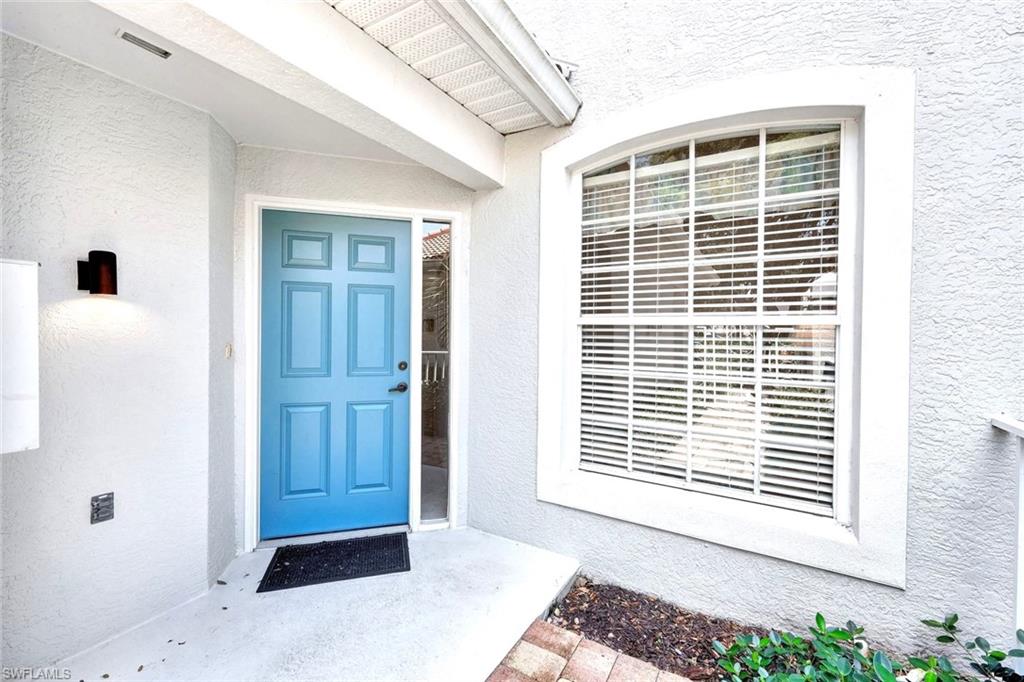 2190 Arielle Drive, Unit 903 Naples, FL 34109 - Photo 3 of 26 a view of front door with outdoor space