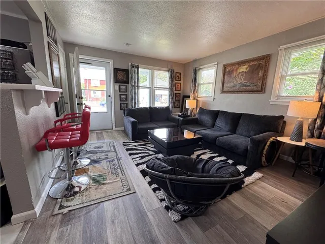 a kitchen with a table and chairs in it