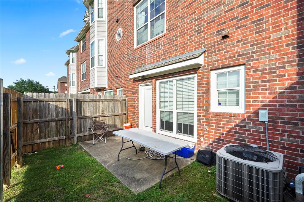 1198 Jones-Butler Road, Unit 203 College Station, TX 77840 - Photo 16 of 18 Fenced backyard with a patio