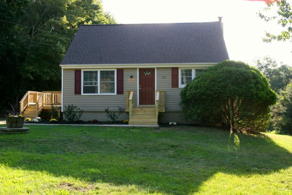527 Squaw Rock Road Killingly, CT 06239 - Photo 1 of 1 a front view of house with yard and green space