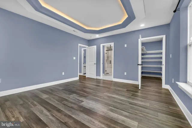 a view of a livingroom with wooden floor