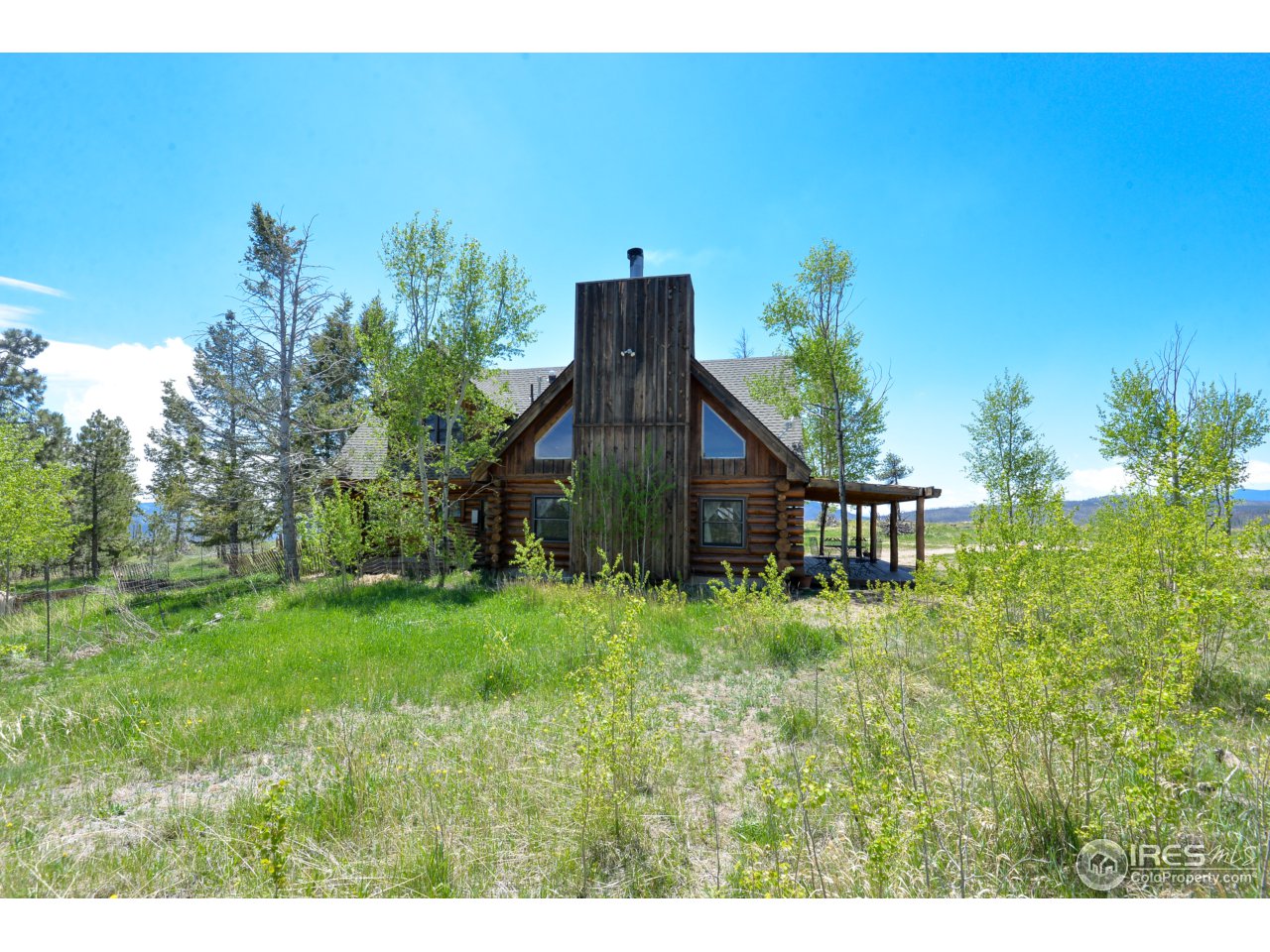 3521 Davis Ranch Road Bellvue, CO 80512 - Photo 6 of 40 a house view with a garden space