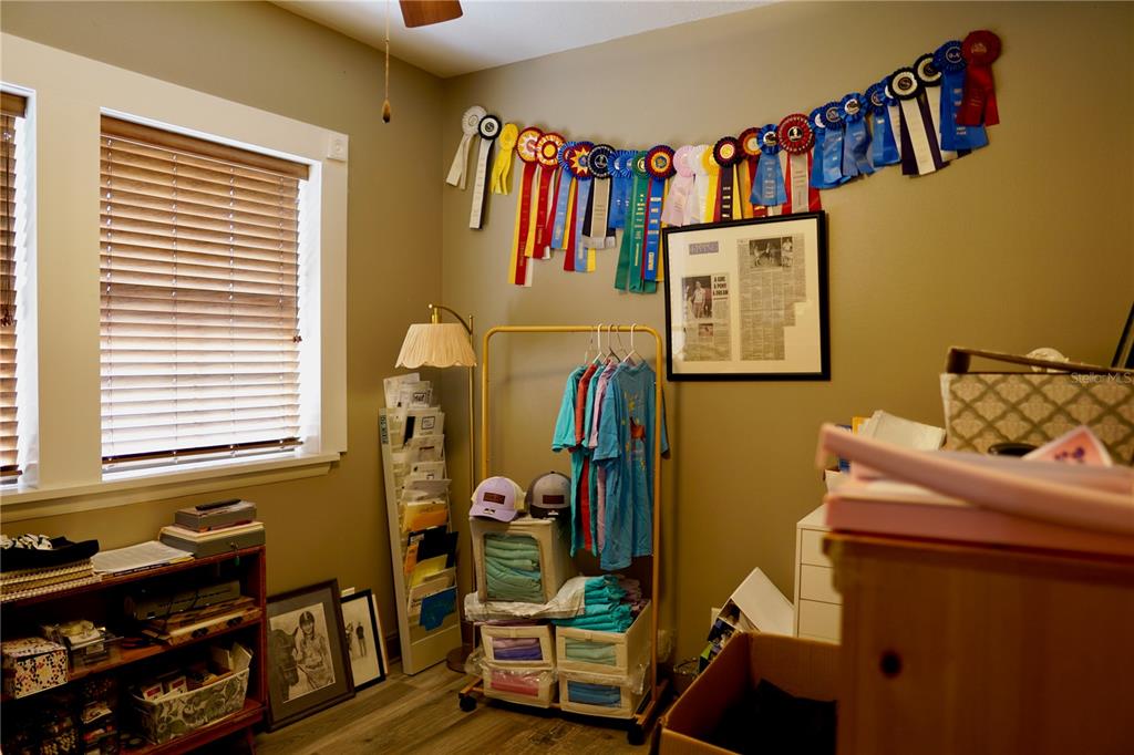 12895 Northwest Gainesville Road Reddick, FL 32686 - Photo 17 of 51 a living room with furniture and a window