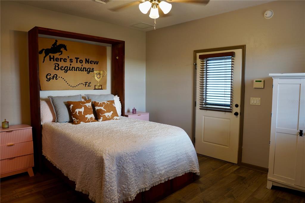 12895 Northwest Gainesville Road Reddick, FL 32686 - Photo 20 of 51 a bedroom with a bed and a window