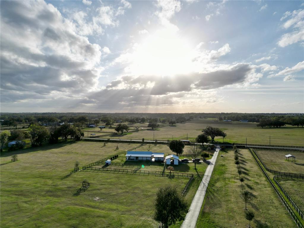 12895 Northwest Gainesville Road Reddick, FL 32686 - Photo 3 of 51 a view of a lake with a yard