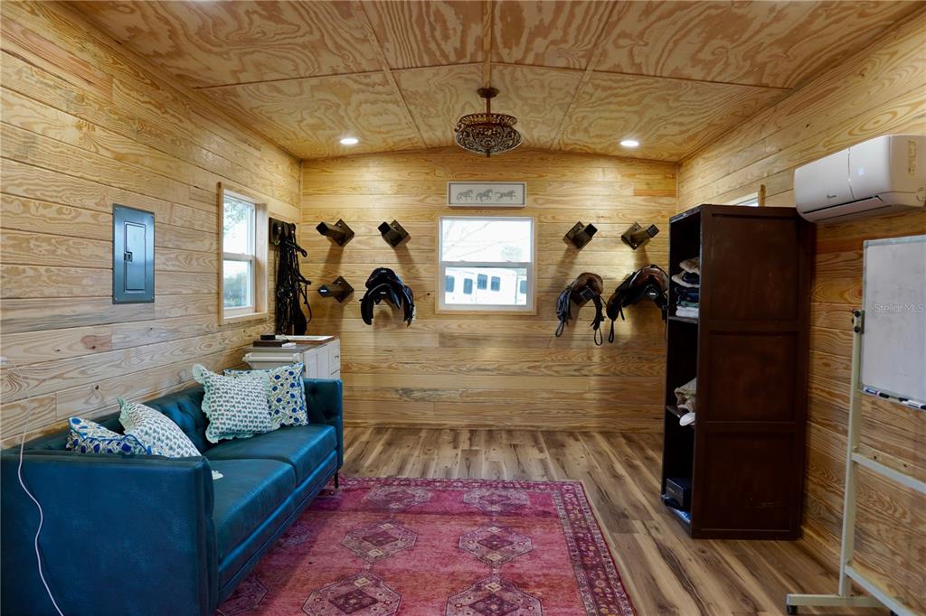 12895 Northwest Gainesville Road Reddick, FL 32686 - Photo 31 of 51 a living room with furniture and a wooden floor