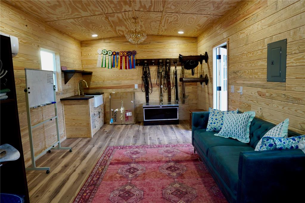12895 Northwest Gainesville Road Reddick, FL 32686 - Photo 35 of 51 a living room with furniture and a wooden floor