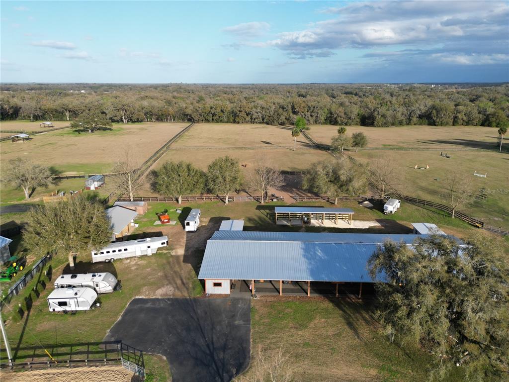 12895 Northwest Gainesville Road Reddick, FL 32686 - Photo 4 of 51 an aerial view of a house with beach