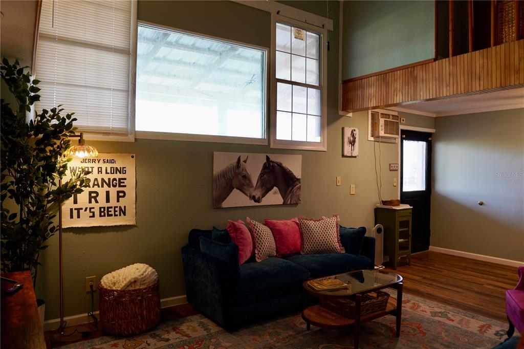 12895 Northwest Gainesville Road Reddick, FL 32686 - Photo 50 of 51 a living room with furniture flowerpot and window