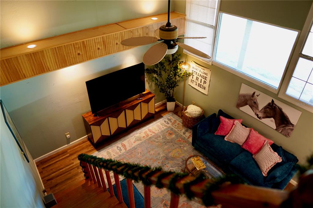 12895 Northwest Gainesville Road Reddick, FL 32686 - Photo 51 of 51 a living room with furniture and a flat screen tv