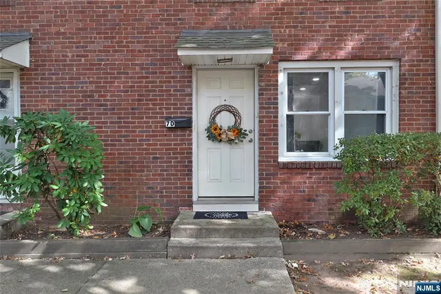 a front view of a house with entryway