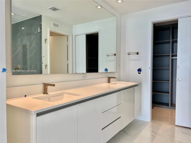 a view of a street with plants