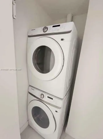 a view of swimming pool with seating area