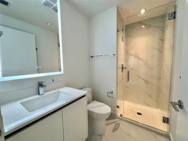 a view of a swimming pool with a lounge chair