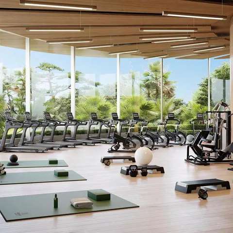 a front view of a building with a garden