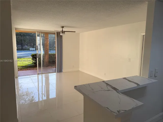 $2,050 | 10773 Cleary Boulevard, Unit 104, Plantation, FL 33324