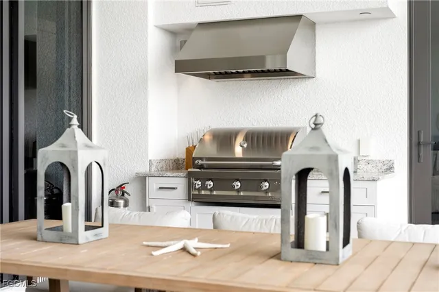 a kitchen with a stove and a microwave
