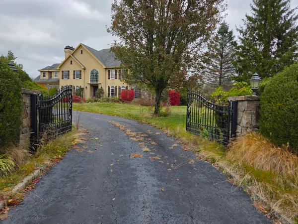 a view of house with outdoor space and street view