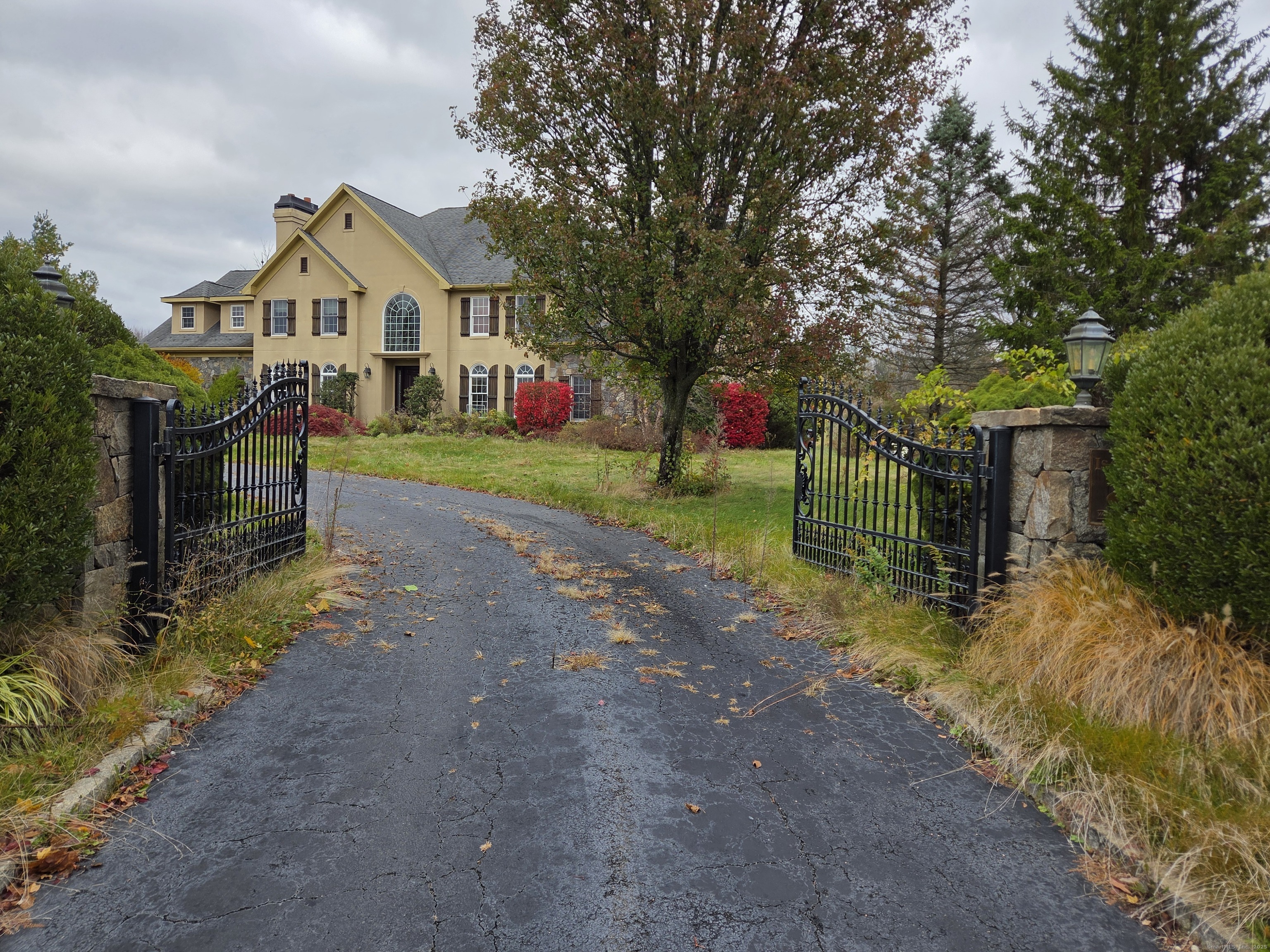a view of house with outdoor space and street view