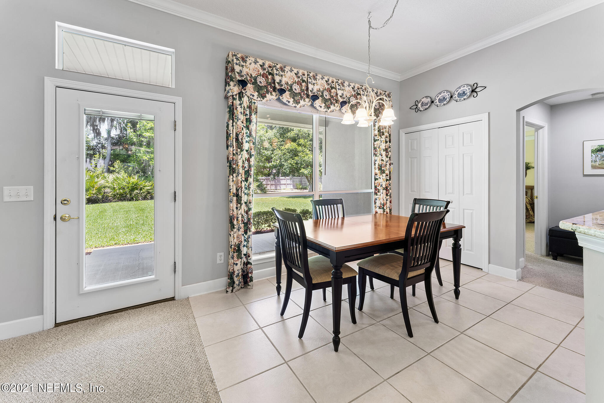 2284 Emilys Way Fleming Island, FL 32003 - Photo 13 of 52 a view of a dining room with furniture window and outside view