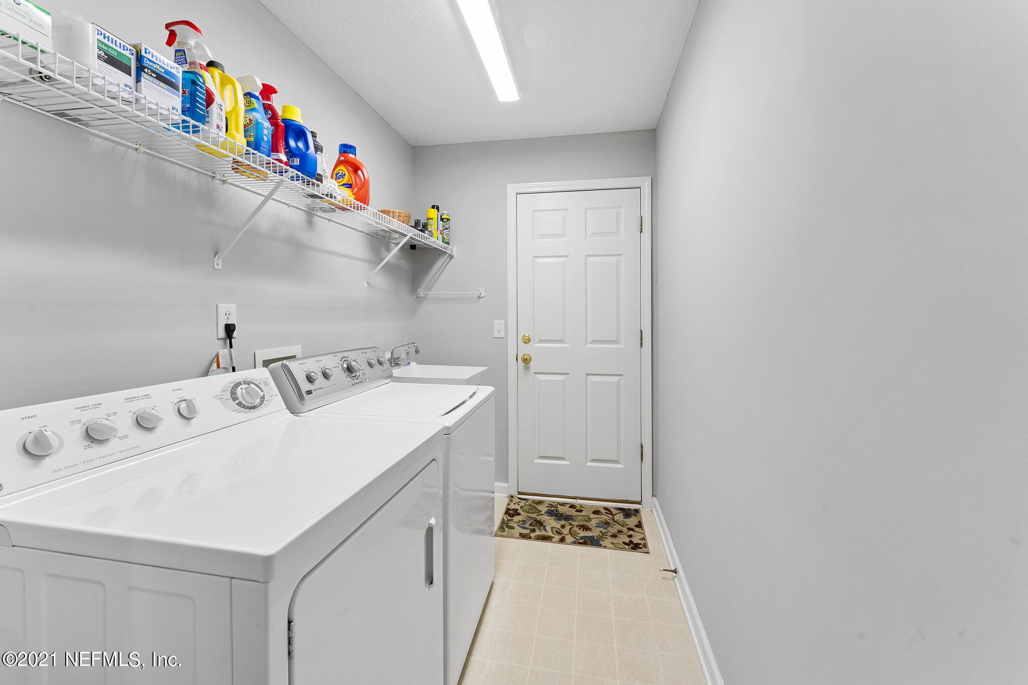 2284 Emilys Way Fleming Island, FL 32003 - Photo 20 of 52 a utility room with dryer and washer