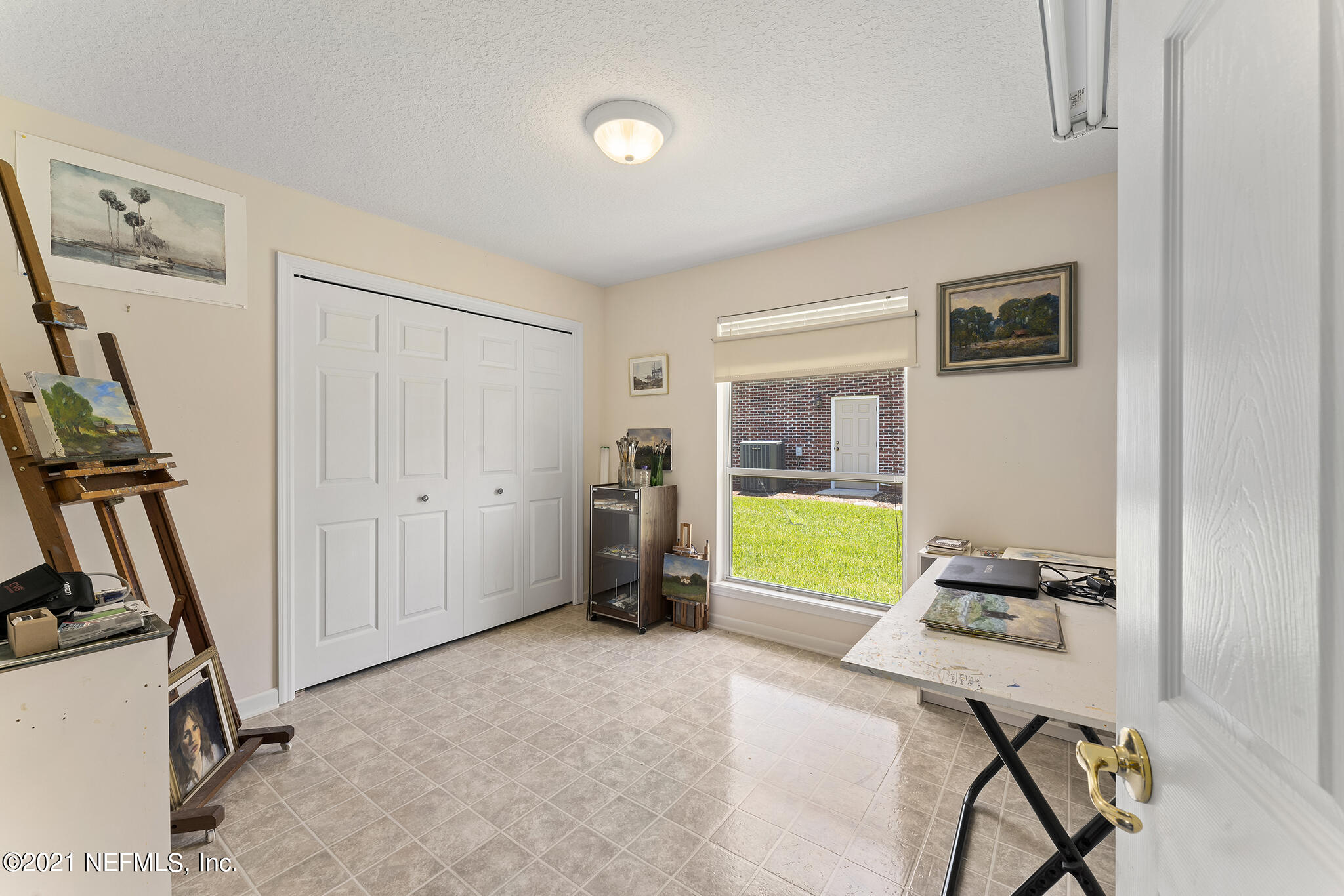 2284 Emilys Way Fleming Island, FL 32003 - Photo 28 of 52 a bedroom with a workspace