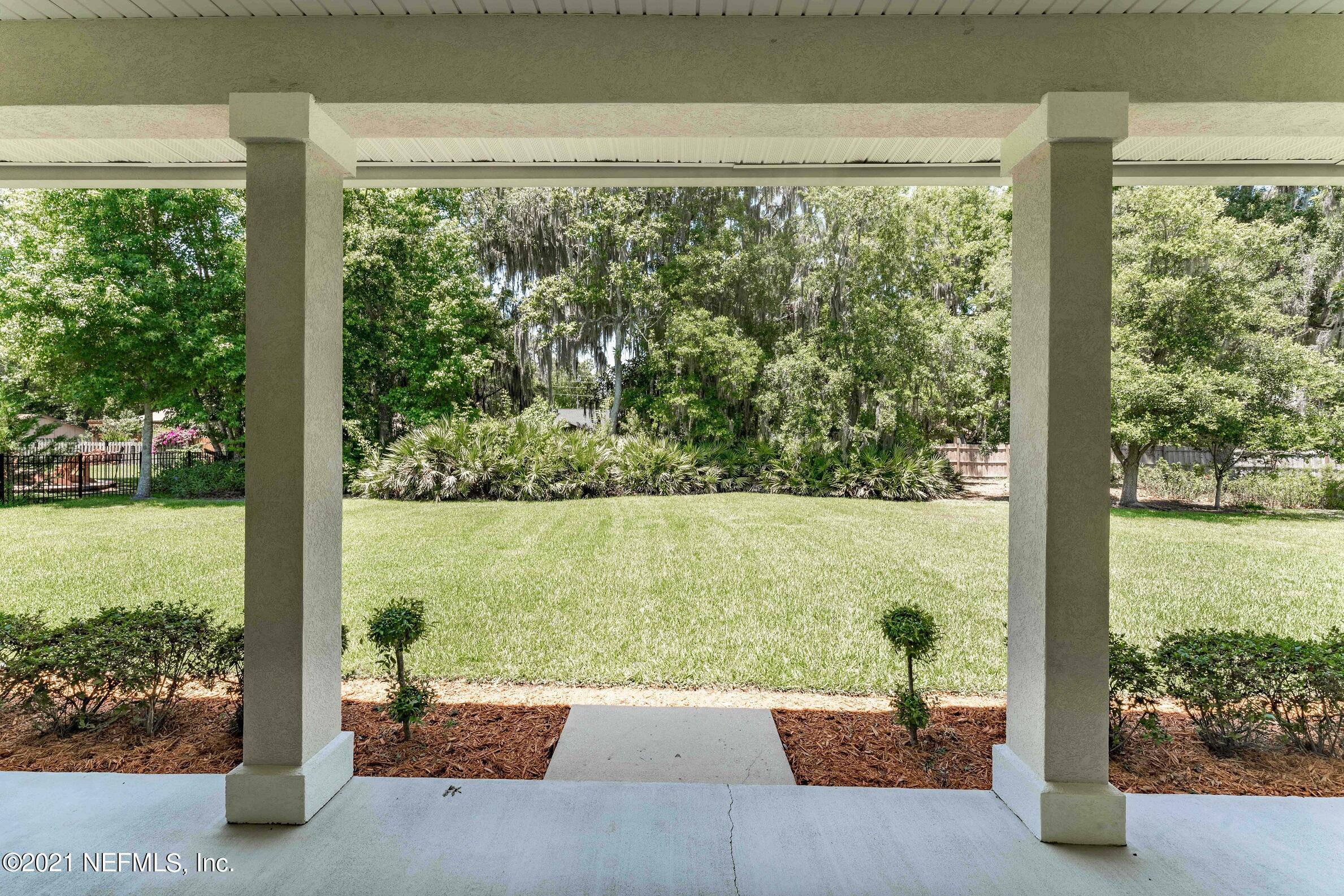 2284 Emilys Way Fleming Island, FL 32003 - Photo 31 of 52 a view of yard from a balcony