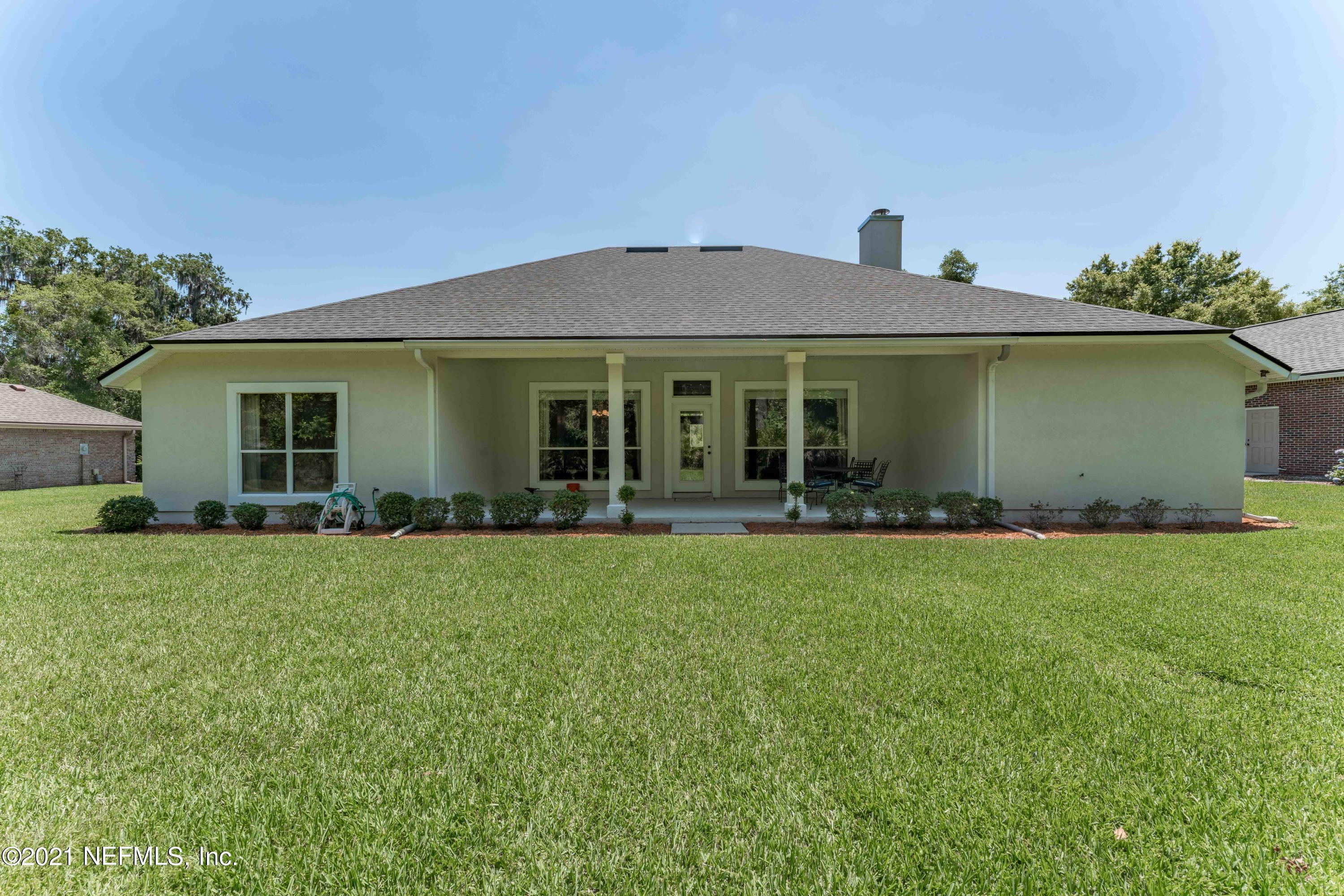 2284 Emilys Way Fleming Island, FL 32003 - Photo 47 of 52 front view of a house with a yard