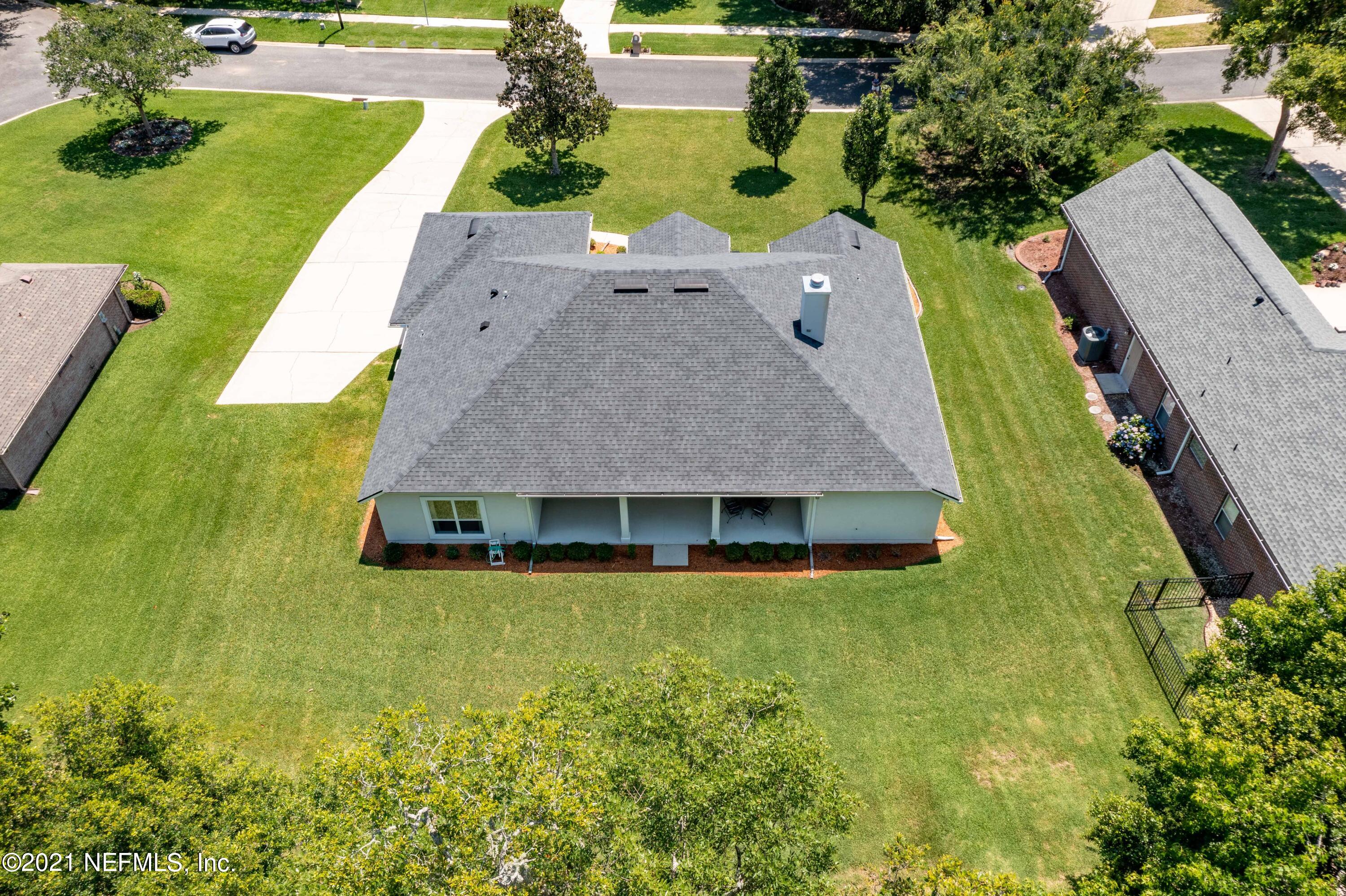 2284 Emilys Way Fleming Island, FL 32003 - Photo 49 of 52 an aerial view of a house with a swimming pool
