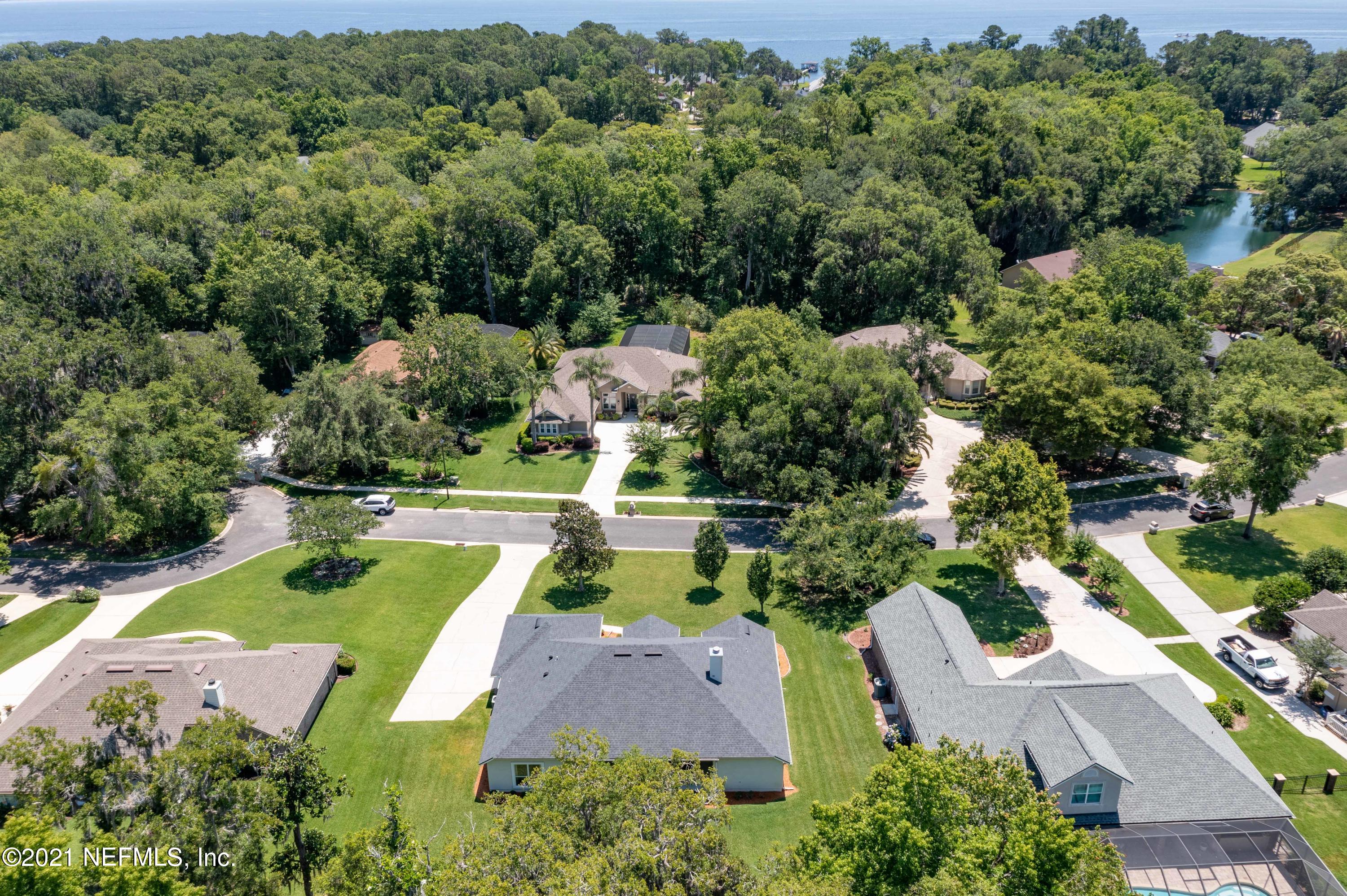 2284 Emilys Way Fleming Island, FL 32003 - Photo 50 of 52 an aerial view of a house with swimming pool outdoor seating and yard