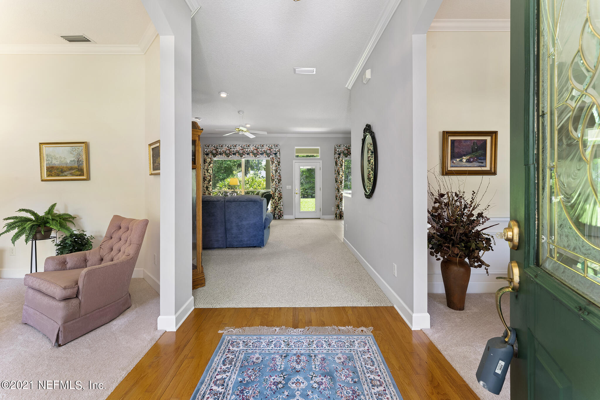 2284 Emilys Way Fleming Island, FL 32003 - Photo 5 of 52 a living room with furniture and a potted plant