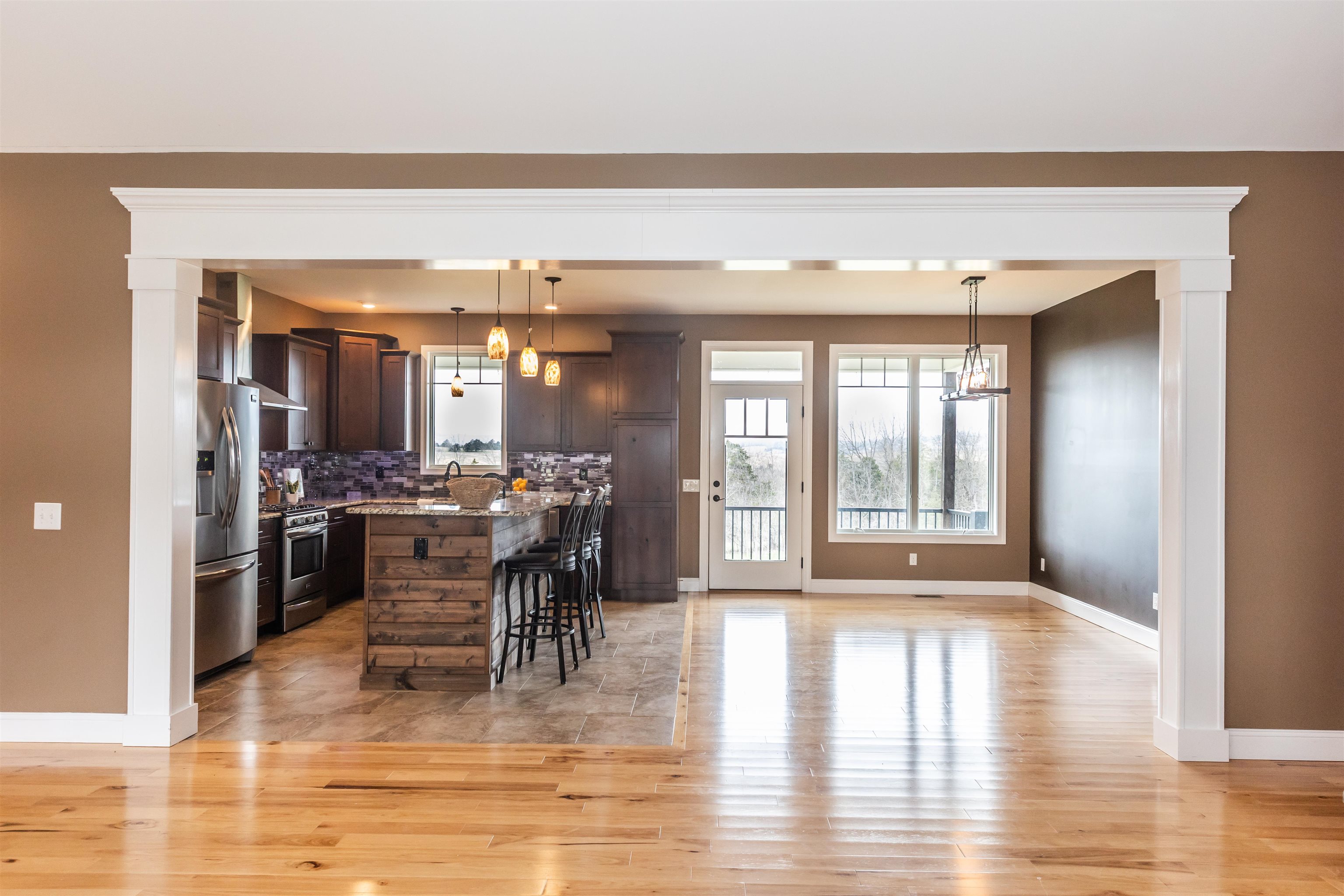 165 Marl Ridge Road Lexington, VA 24450 - Photo 13 of 72 a view of a dining room with furniture window and wooden floor