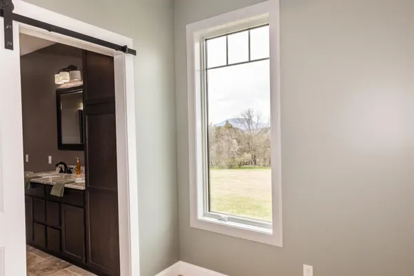 a view of a room that has a window in it